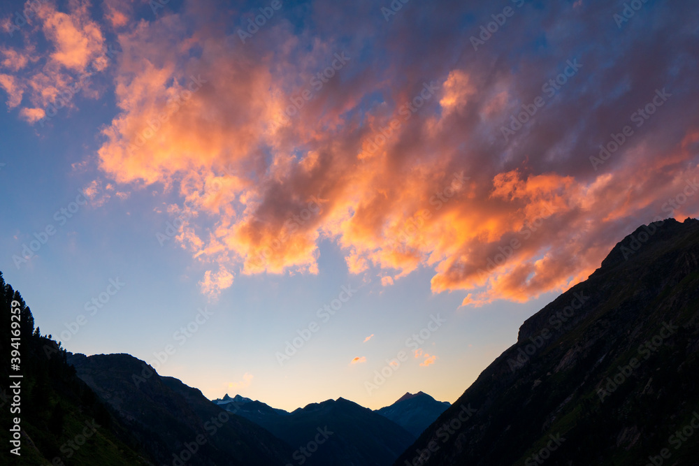 silhouette shot image of mountain and sunset sky in background.(vintage tone), Hohe Tauern Austrian Alps, Europe