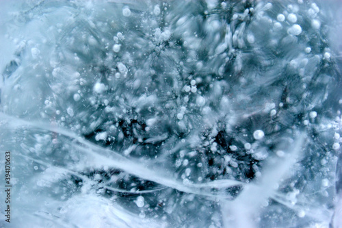 Blue blocks of ice close up with bubbles and cracks © Lushchikov Valeriy