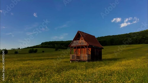 Sweet house in middle of the field, time lapse , Beautiful panorama with clouds and forest with a alone house in middle of field