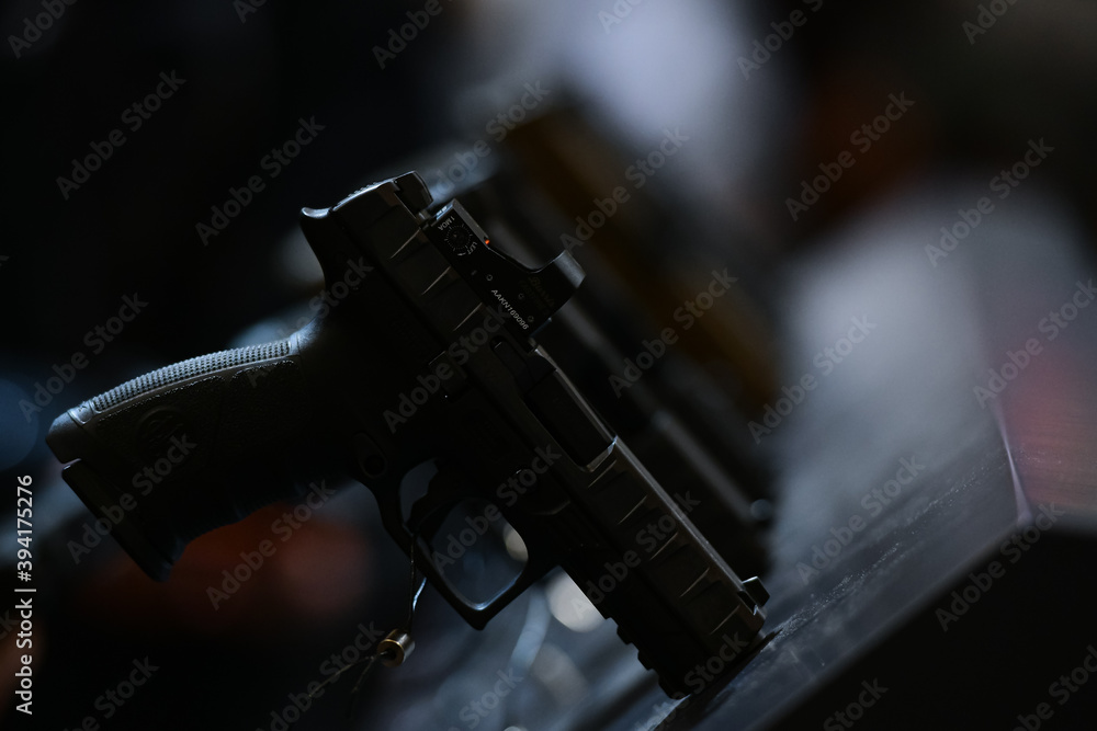 Fototapeta premium Vicenza, Italy - February 8, 2020: The Beretta APX, a striker-fired semi-automatic pistol, is on display at Hit Show 2020, trade fair show dedicated to hunting, target sports and outdoor