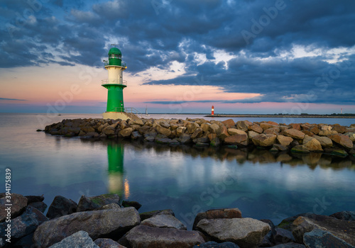 Green Warnemuende Lighthouse at sunset