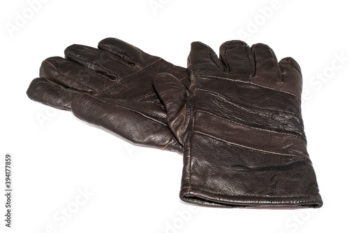 Pair of men's black leather gloves isolated on white background.