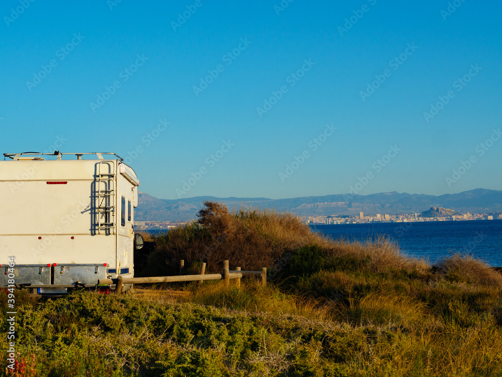 Camper car on beach sea shore