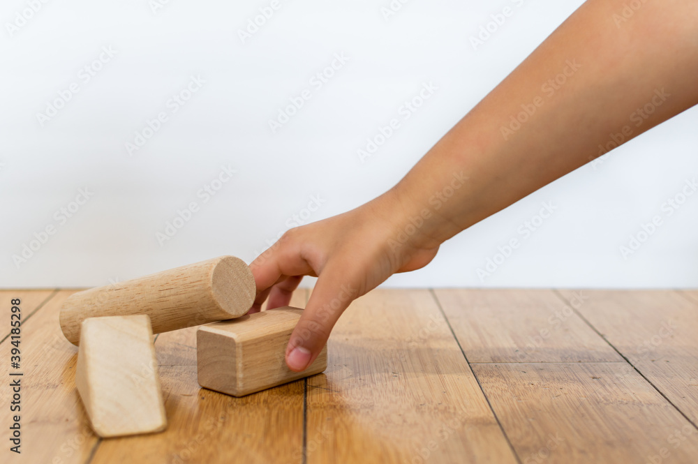 Kid playing with wooden blocks. Kid playing with wooden blocks.