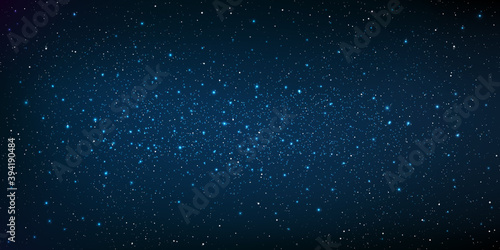 A high quality background galaxy illustration with stardust and bright shining stars illuminating the space. © KICKINN