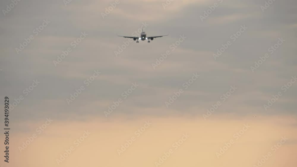 Airliner on final approach. View from the runway's edge Airliner on final approach. View from the runway's edge