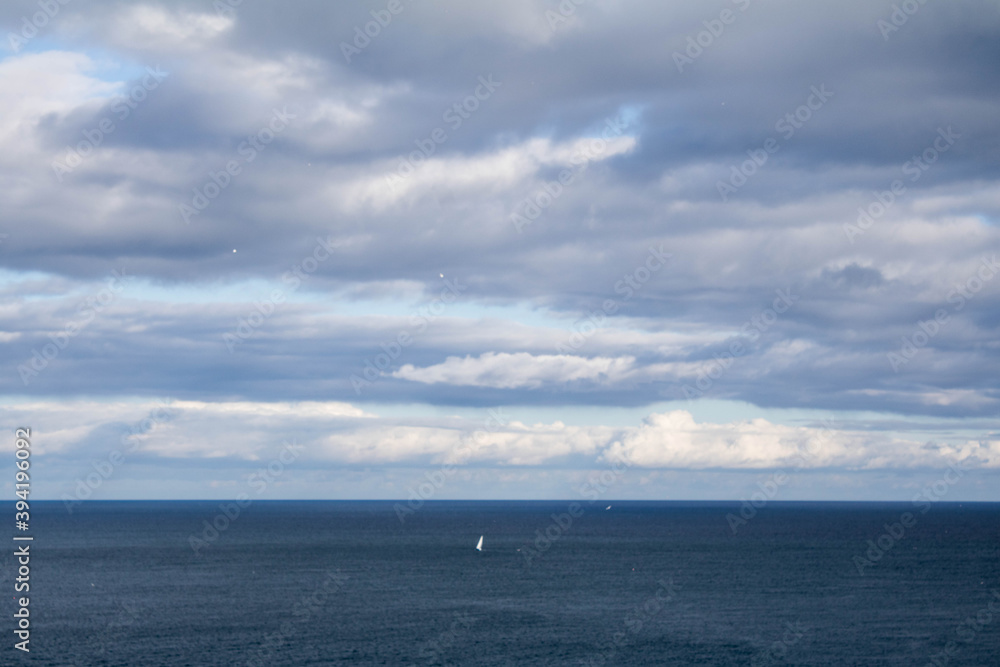 Lone sailboat crossing the Atlantic. 