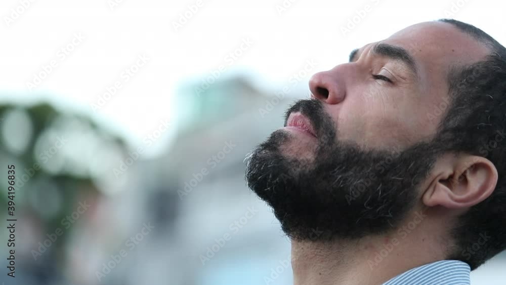 Faithful 40 year old man looking at sky with hope Faithful 40 year old man looking at sky with hope