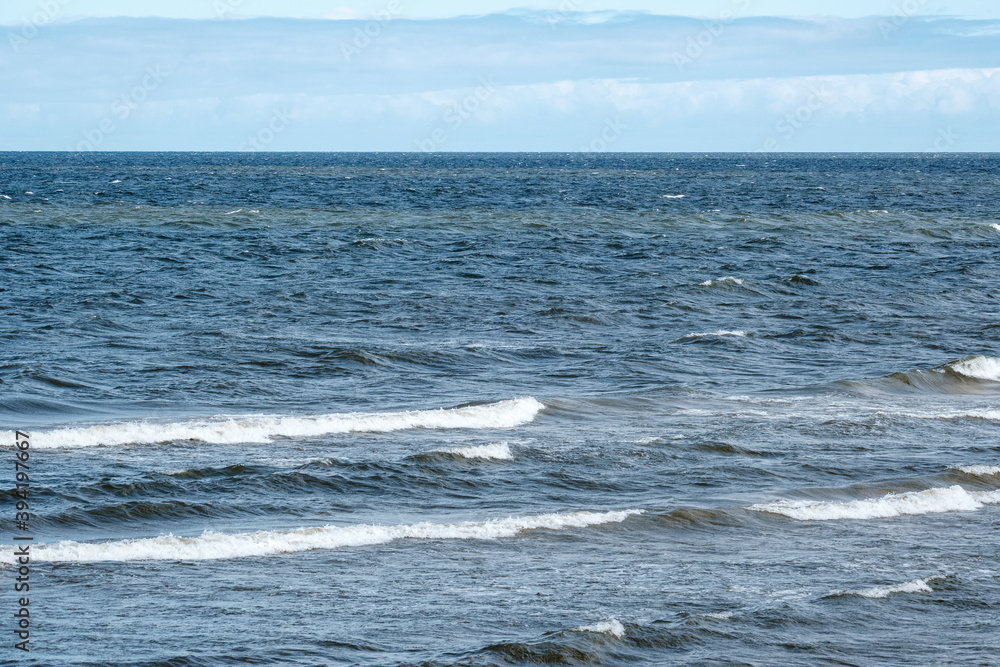 Fototapeta premium sea beach with white sand and blue water before storm