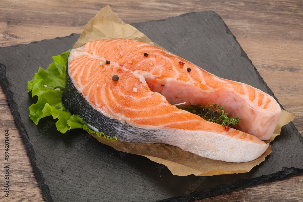 Raw salmon steak - ready for grill Raw salmon steak - ready for grill