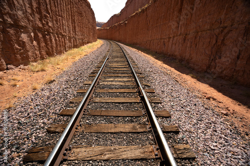rail road tracks cut through solid rock near Moab Utah