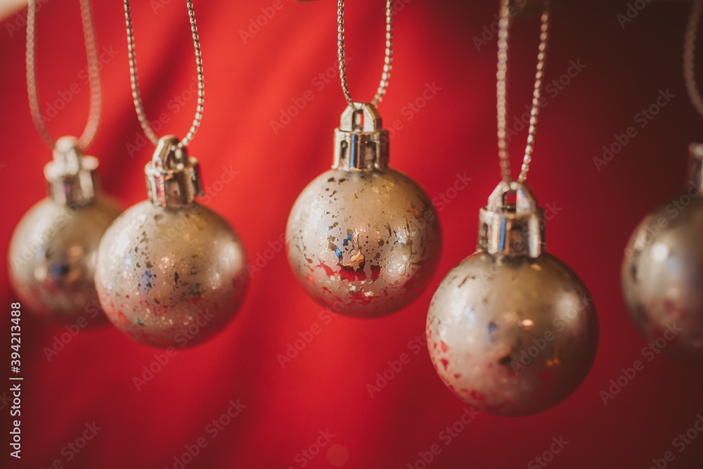 Golden christmas balls on red background. Christmas background. Golden christmas balls on red background. Christmas background.