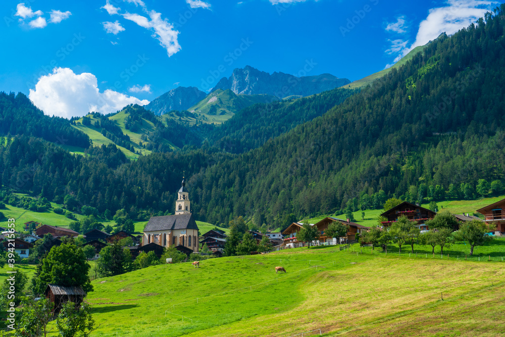 Mountain valley village landscape in Venediger alps . Mountain green valley village view austria near matrei in osttirol