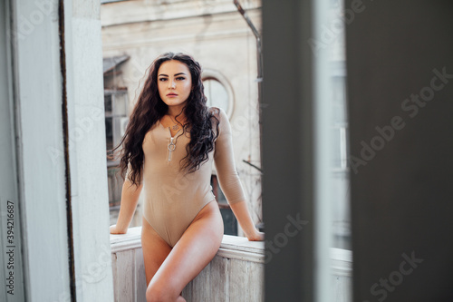 Portrait of a beautiful fashionable brunette woman in stylish clothes Free Download Portrait of a beautiful fashionable brunette woman in stylish clothes - GFXLoad