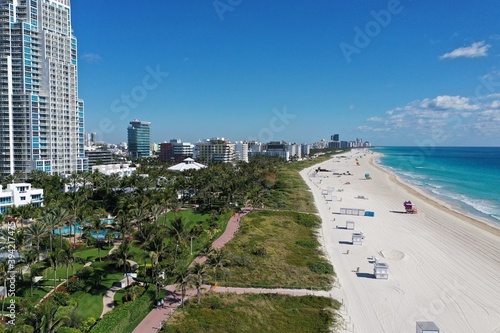 Aerial view of South Pointe Park and South Beach in Miami Beach, Florida devoid of people under coronavirus pandemic beach and park closure.