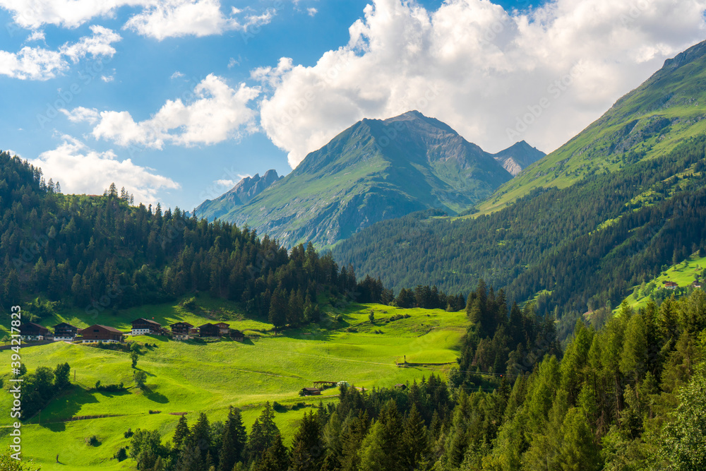 Obraz premium Mountain valley village landscape in Venediger alps . Mountain green valley village view austria near matrei in osttirol