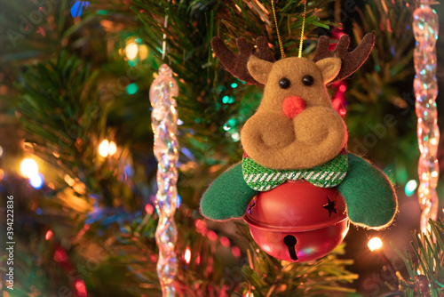Jingle bell reindeer Christmas tree decoration, ornament. Christmas card.