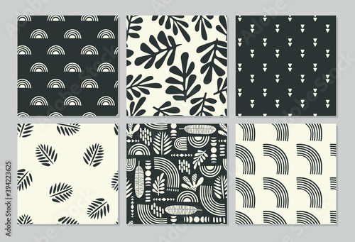 Artistic seamless patterns with abstract leaves and geometric shapes