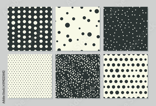 Abstract seamless patterns with drawing polka dots. Modern vector design