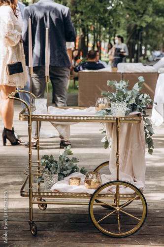 Trolley for serving food and drinks. The waiter's tool. © dimadasha