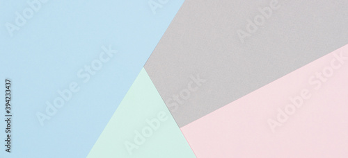Abstract colored paper texture background. Minimal geometric shapes and lines in blue, light green, pastel pink, gray colours