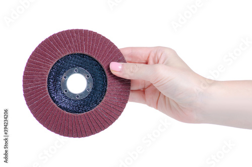 Foto flap disc for grinder in hand on white background isolation