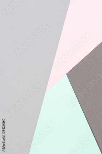 Abstract colored paper background. Minimal geometric shapes and lines in pastel pink, light green and gray colours