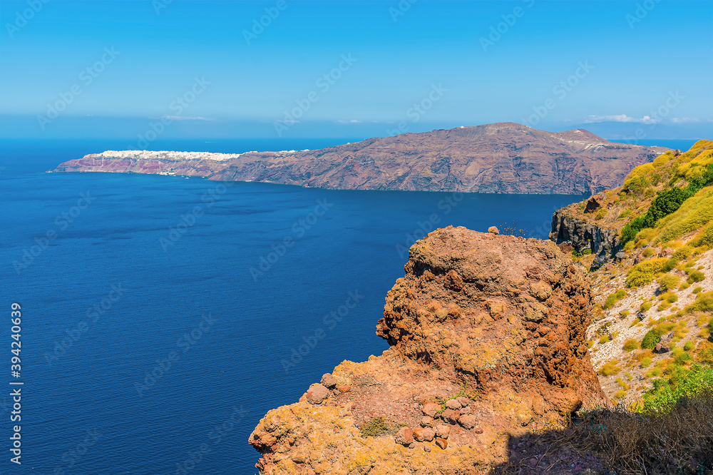 A view from Skaros rock towards Oia in the distance in summertime