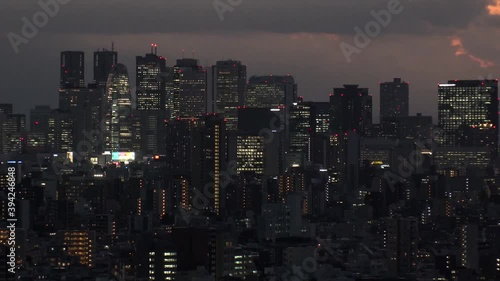 Wallpaper Mural TOKYO, JAPAN : Aerial high angle sunrise CITYSCAPE of TOKYO. View of buildings at around Shinjuku. Japanese urban metropolis concept shot. Long time lapse shot night to morning. Wide tracking shot. Torontodigital.ca
