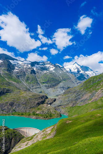The beautiful view of mountain nature with lake in Glockner alps europe- taken from The Grossglockner High Alpine Road - Grossglockner Hochalpenstrasse