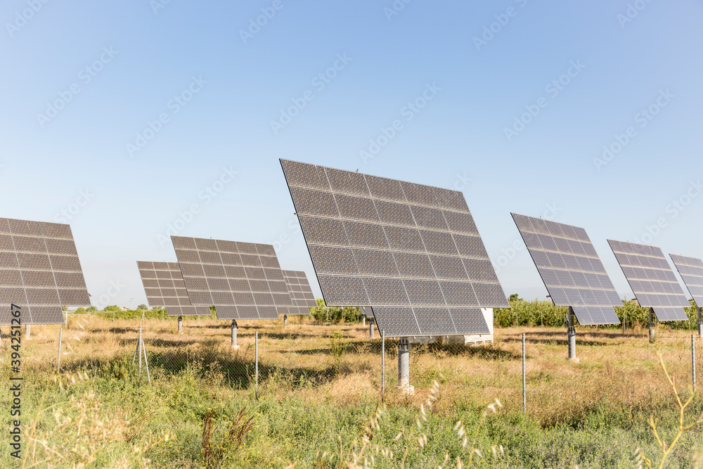 Solar panels on a power station - renewable energy Solar panels on a power station - renewable energy