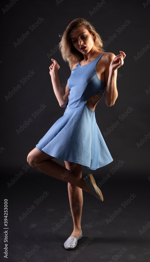 Naklejka premium female figure in clothes, studio portrait