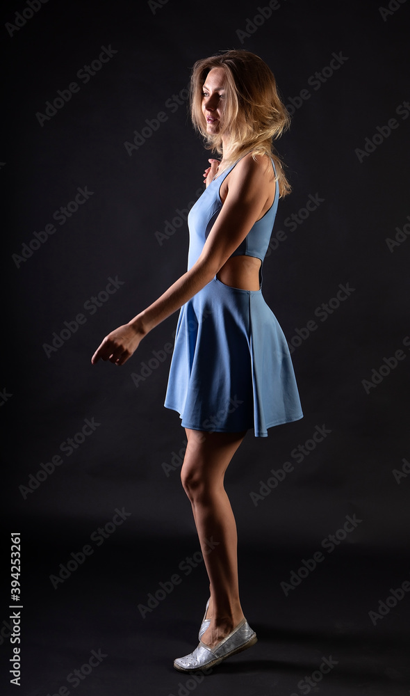 Naklejka premium female figure in clothes, studio portrait