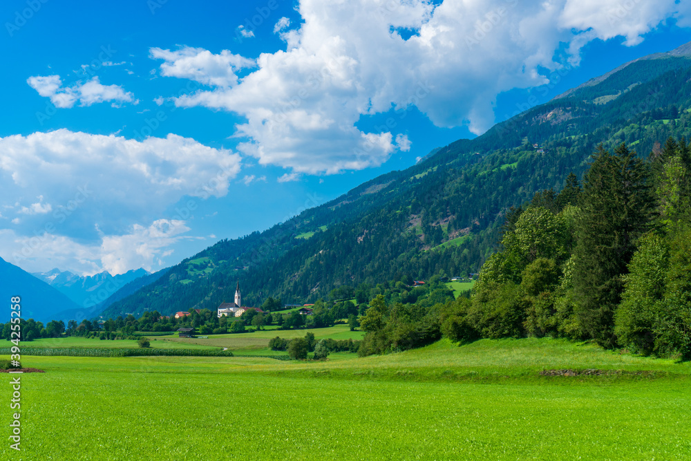 Obraz premium Mountain valley village landscape in Venediger alps . Mountain green valley village view austria near matrei in osttirol
