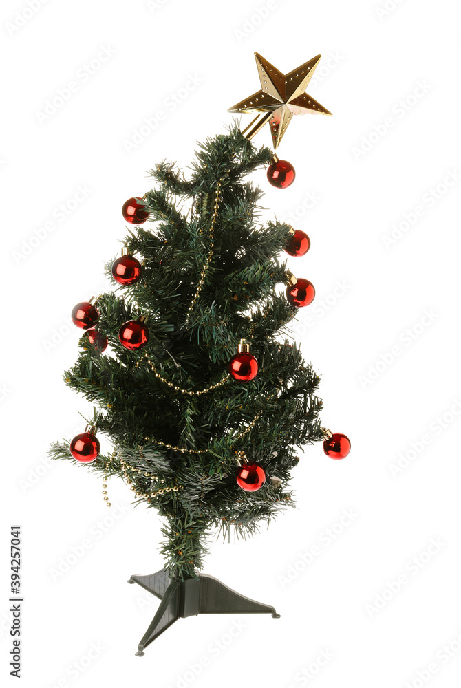 Table top plastic Christmas tree isolated on whie