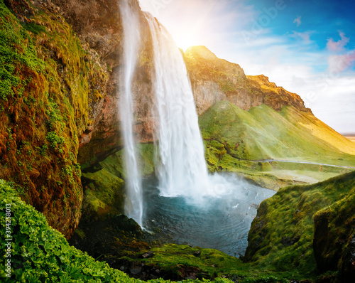 Great view of powerful Seljalandsfoss waterfall in the sunny day. Location place Iceland, Europe.