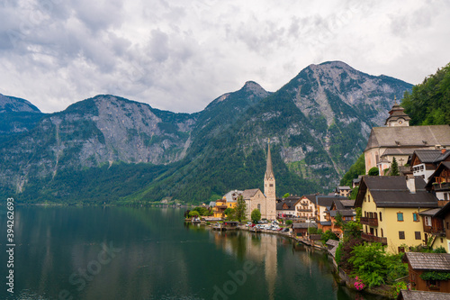 Colorful houses at picture-postcard view of famous Hallstatt mountain village in the Austrian Alps at beautiful light in autumn at Hallstatt, Austria.