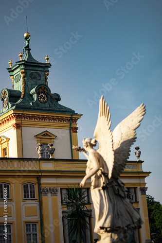statue with palace