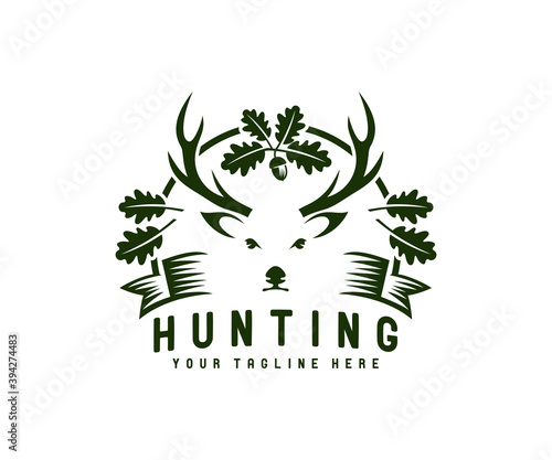 Hunting, hunt, deer with antler in oak foliage, logo design. Animal, wildlife, tree and leaves, vector design and illustration