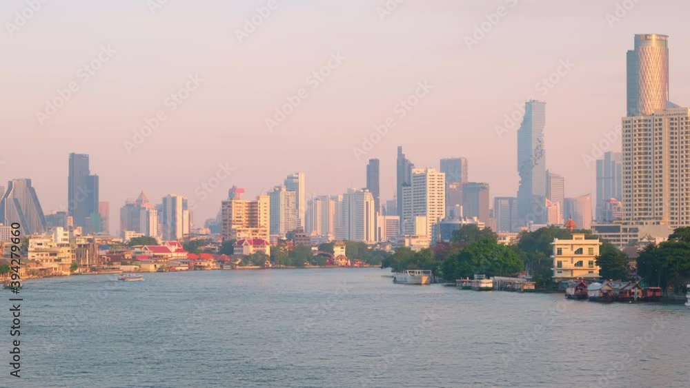 4K Time lapse, View of Bangkok buildings, Boat traffic on the Chao Phraya River, Bangkok city downtown, Thailand 4K Time lapse, View of Bangkok buildings, Boat traffic on the Chao Phraya River, Bangkok city downtown, Thailand