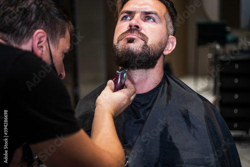 Used to look perfect. brutal hipster with moustache make new hairstyle. barbershop. male trendy hairdo. perfect haircut with blade razor. barber cut hair. mature hipster with beard at hairdresser