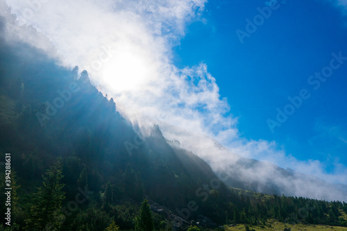 Majestic mountains landscape under morning sky with clouds. Alps , Austria, Europe.