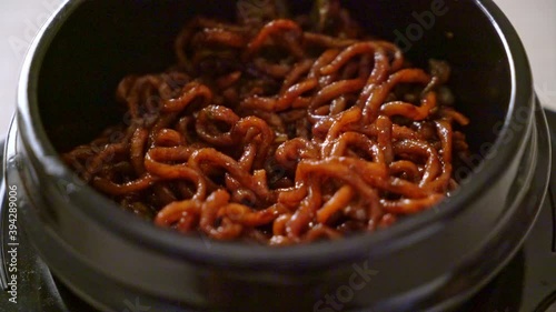 Korean black spaghetti or instant noodle with roasted chajung soybean sauce (chapagetti) - Korean food style photo