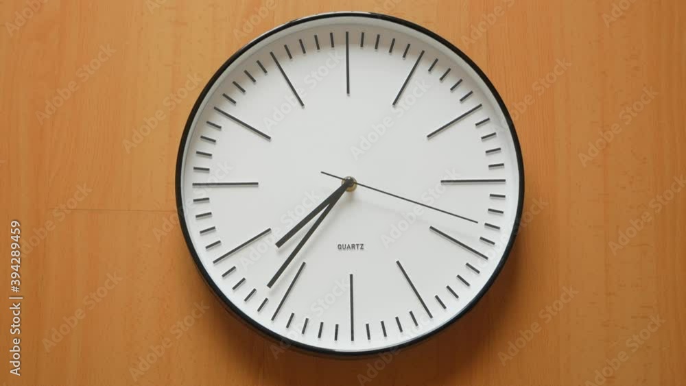 Time Lapse Of One Minute On Quartz Clock Face. - close up static shot Time Lapse Of One Minute On Quartz Clock Face. - close up static shot