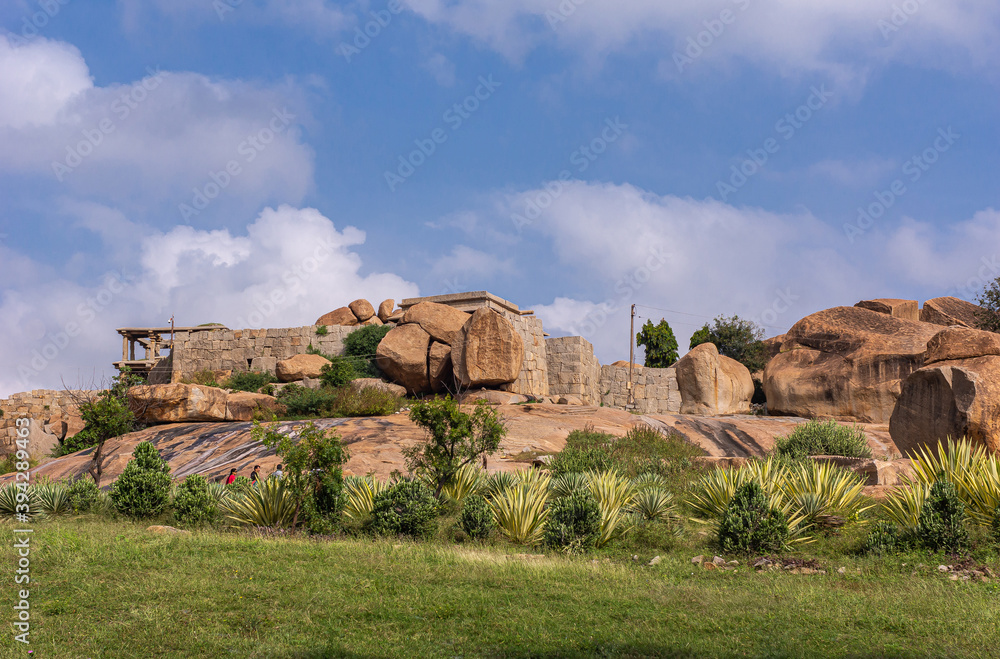 Hemakatu hillock where Sasivekalu Ganesha resides, Krishnapura, Karnataka, India - November 4, 2013: the Hemakatu hillock where small temple and Sasivekaly Ganesha or Mustard Seed resides under blue c