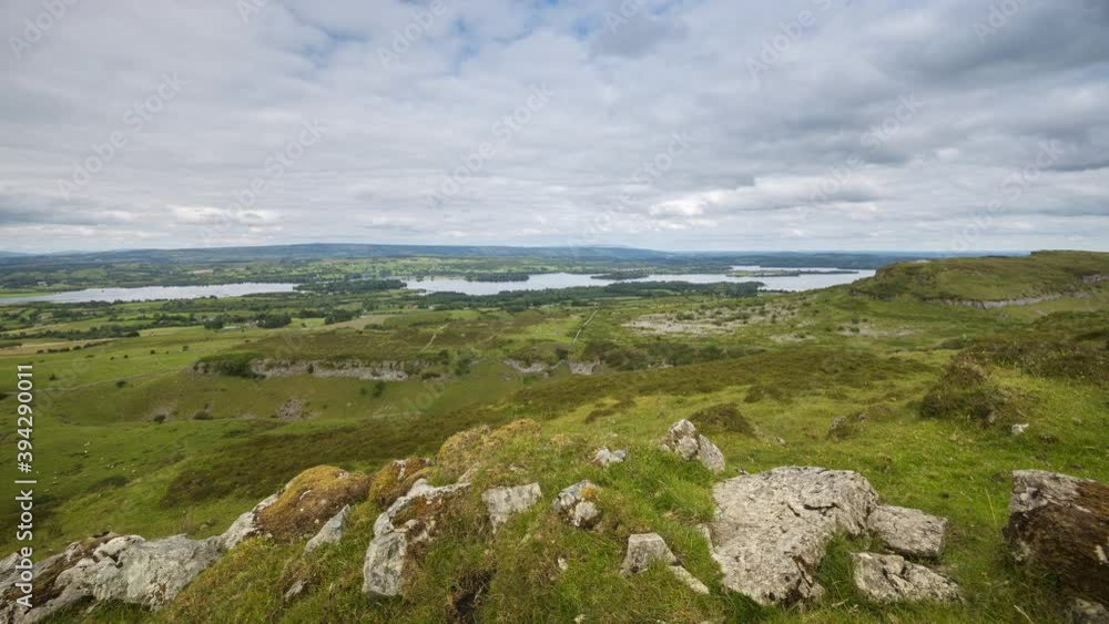 Time lapse of rural and remote landscape of grass, trees and rocks during the day in hills of Carrowkeel in county Sligo, Ireland. Time lapse of rural and remote landscape of grass, trees and rocks during the day in hills of Carrowkeel in county Sligo, Ireland.