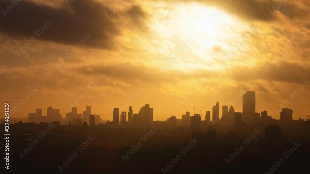 Timelapse of beautiful sun rays over iconic London skyline hazy morning Timelapse of beautiful sun rays over iconic London skyline hazy morning