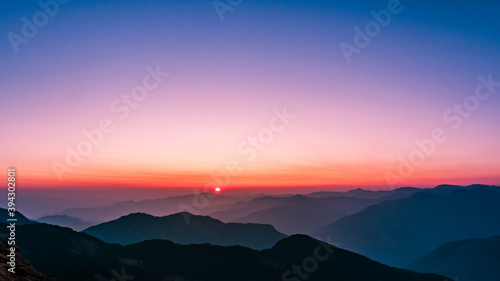 Spectacular view during sunset in Himalayas on an autumn evening from Chandrashila hiking trail at Chopta Uttarakhand India.