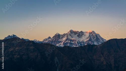 Mystical Chaukhamba peaks of Garhwal Himalayas during twilight from Deoria Tal camping site near Tungnath of Uttarakhand.