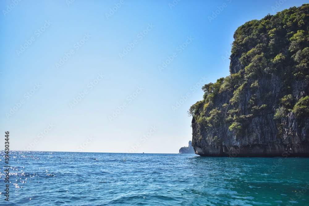 Thailand, Koh Phi Phi, travelling by boat around this paradise island with turquoise water and stunning beaches.  We loved that! 